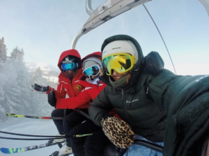 three people on ski lift