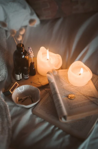 candles and a book 
