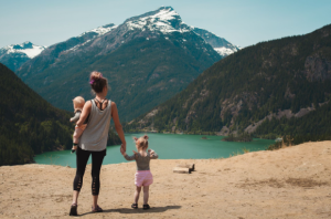 mom with kids at a mountain 