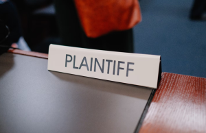 sign showing Plaintiff 